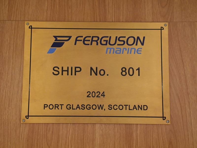 A plaque onboard The Glen Sannox ferry as it journeys from Troon to Brodick on Isle of Arran on its first official day in service.