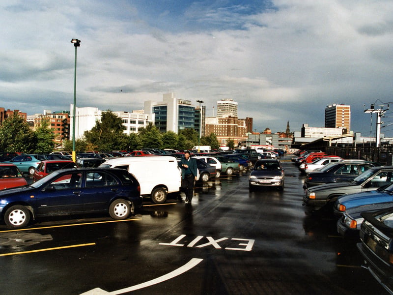 The car park on Whitehall Road showning parked cars, railway track leading to Leeds City Station can be seen on the right, photo is looking in direction of the city centre. Pictured in September 1999.