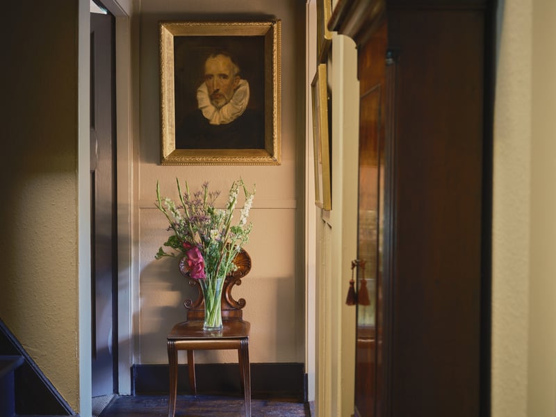 The hallway, with the bottom of the short staircase