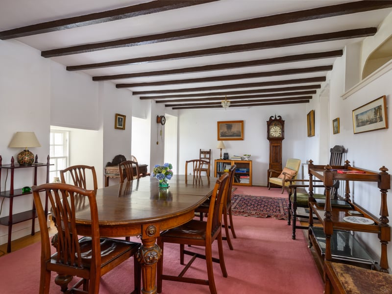 The dining area of Seven Gables with its exposed timber beams, a nod to its 17th century origin