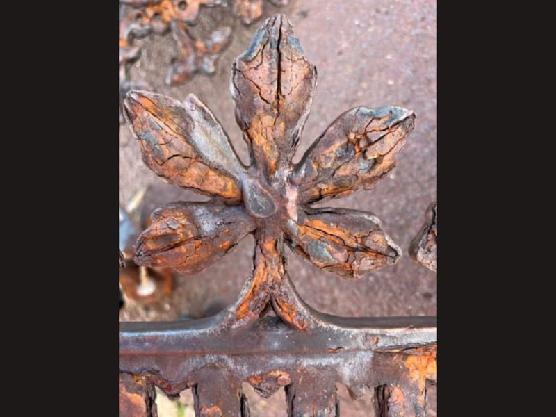 Corroded ironwork from shelter - before