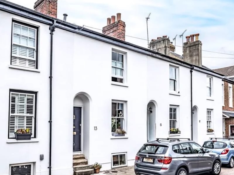 This home comes with three bedrooms, two bathrooms and three reception rooms. 