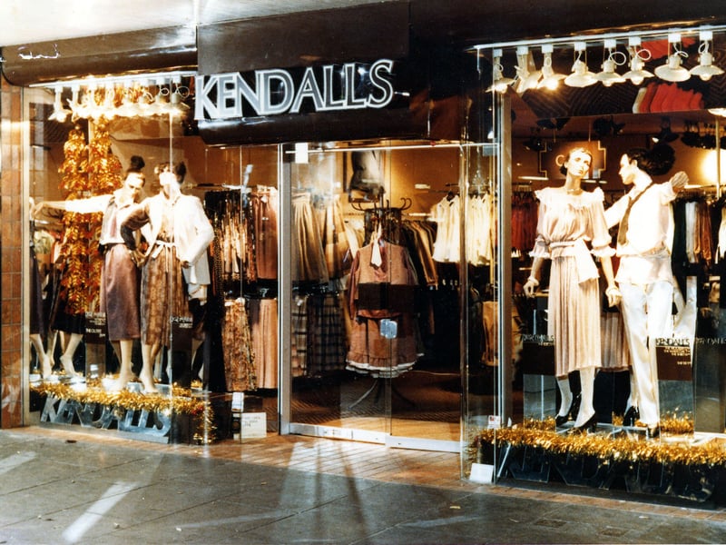 A window display of ladies fashions on sale at Kendall's in Trinity Street Arcade in March  1979. Four mannequins, lit by spotlighting and reflected in mirrored glass, are dressed in styles of the late 1970s. Trinity Street Arcade ran from Trinity Street to Bank Street.