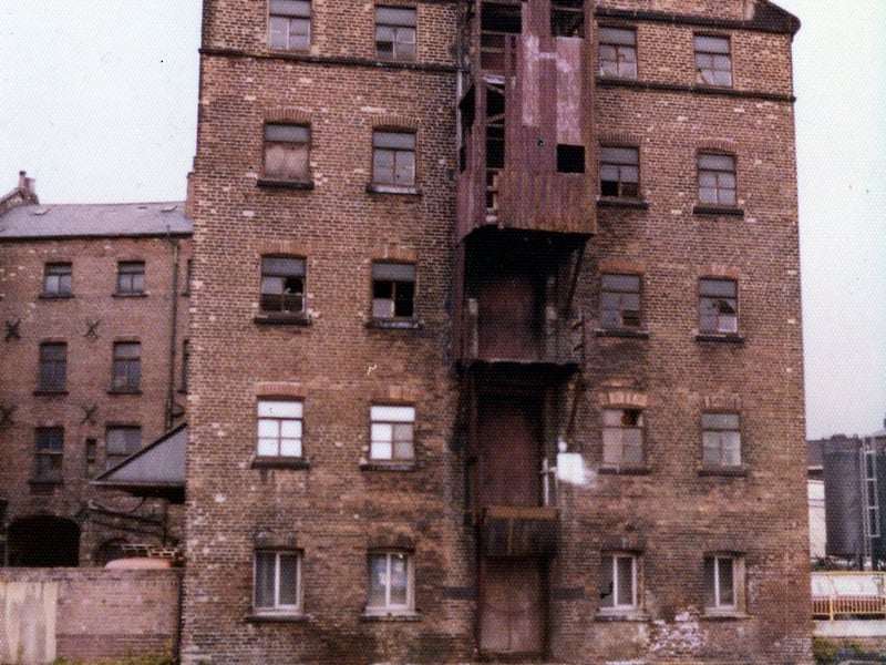 Victoria Mills, a grade II listed building on the south side of Sovereign Street. The red brick built mill on four and five storeys dates from 1836 when it was an oil and dye works. Pictured in December 1979.