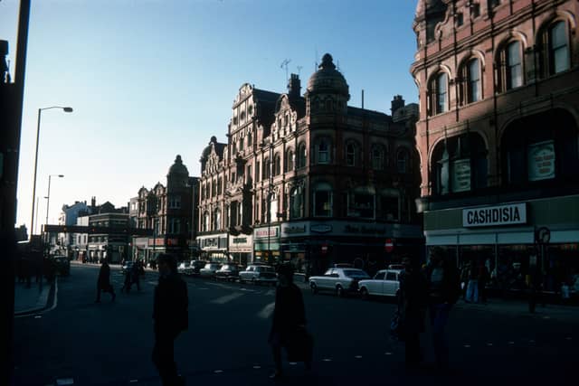 Looking south along Vicar Lane showing shops on the west side in January 1976. On the right is Cashdisia, ladies, mens and childrens wear, then after the junction with Queen Victoria Street are Peter Eastwood menswear, Wigfalls TV and electrical, Halfords cycle and car accessories and John Collier tailor. Next is the junction with King Edward Street then the Famous Army Stores.