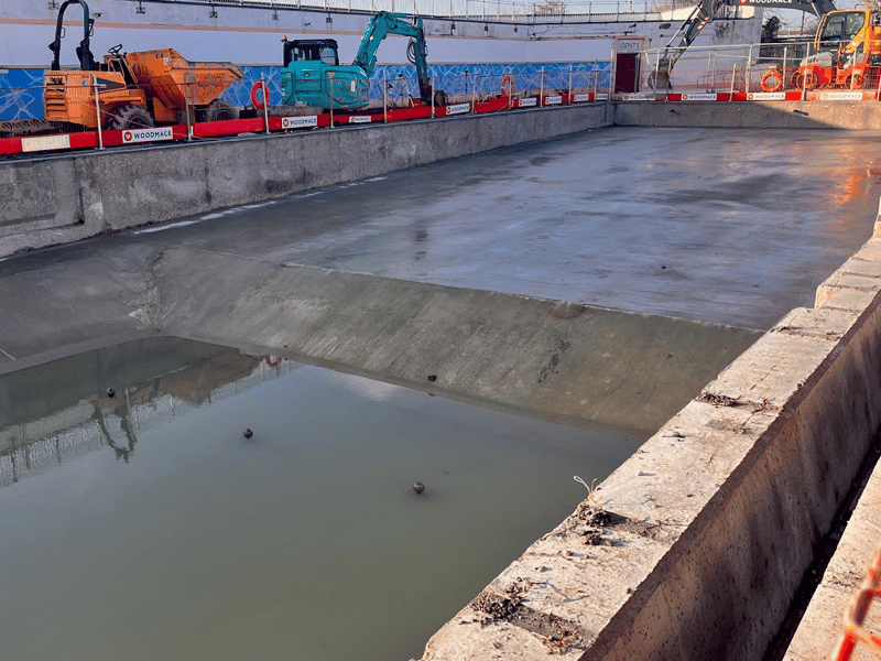 The pool is completely concreted and ready for rendering.