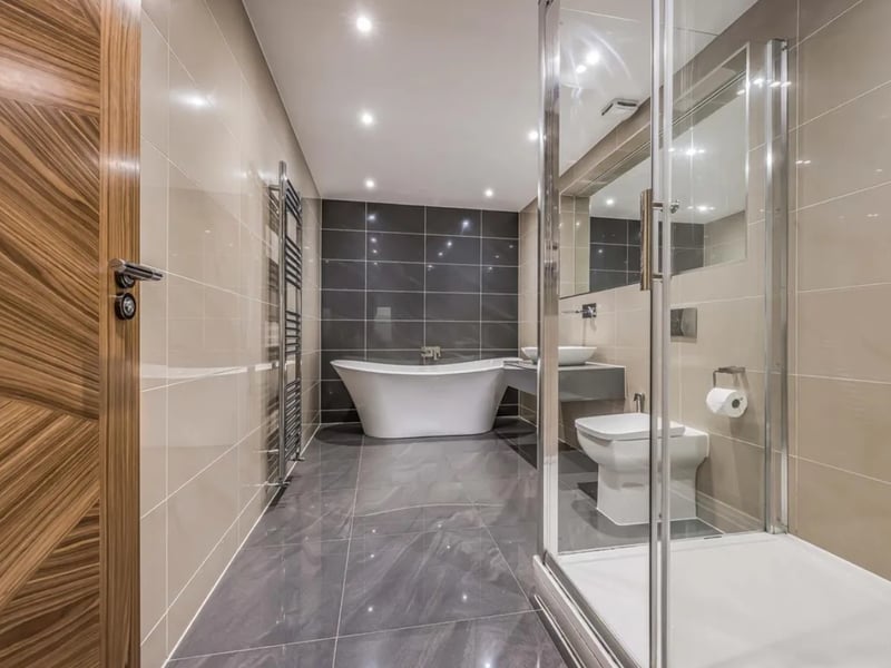 This home comes with three bedrooms, three bathrooms and one reception room.