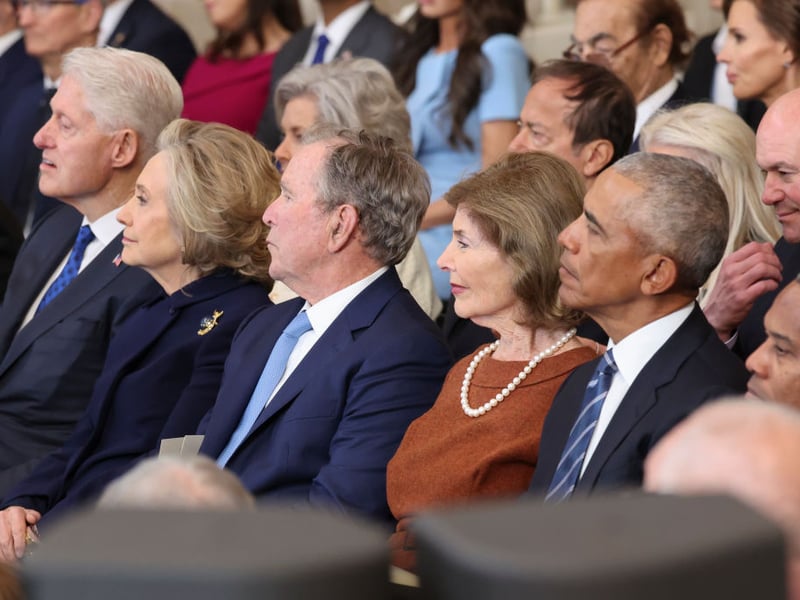 Former presidents Bill Clinton, George W. Bush and Barack Obama look on.