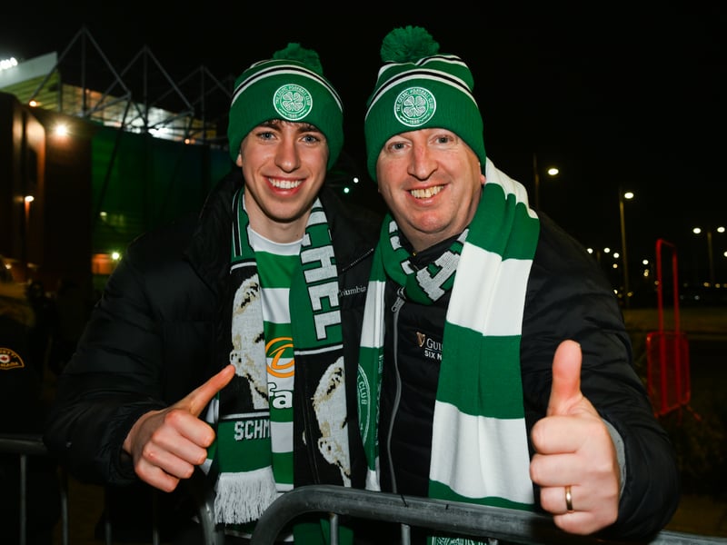 Two Celtic fans soak up the pre-game atmosphere.