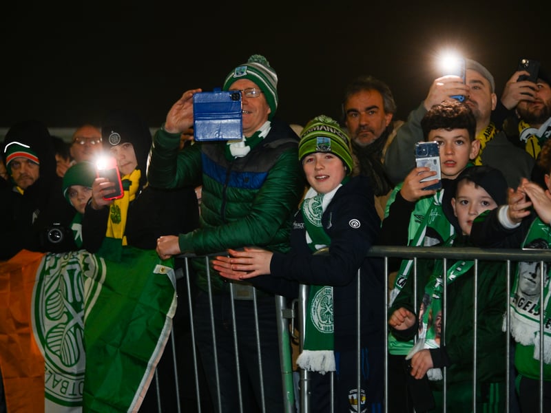 Celtic fans welcome to the team into the ground.