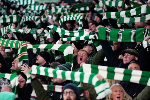 Celtic fans show their support in the stands.