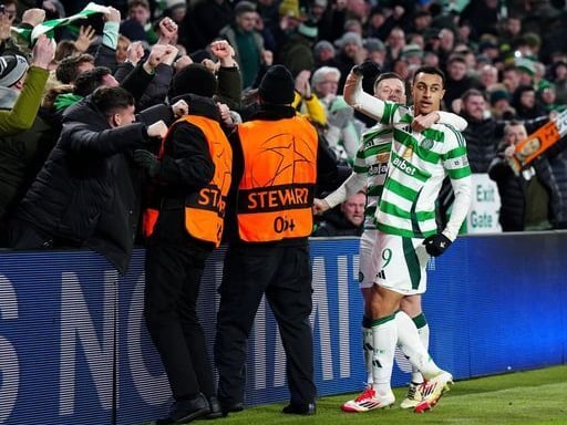 Celtic's Adam Idah celebrates after his shot deflects off Young Boys' Loris Benito to secure the win for the Hoops.