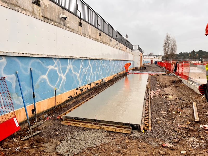 Next to the Hilsea Lido building there is the hard standings for the beach huts. 

One is complete and one was just being finished off. The beach huts will act as changing rooms and will be brightly coloured to tie in the shower blocks we showed you last time. 