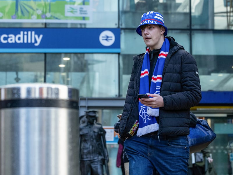 A Rangers fan outside Manchester Piccadilly Station before the game.