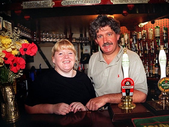 Carol Derbyshire and Donnie McFarlane, landlords of The Rock pub in Pitsmoor, Sheffield, pictured behind the bar in September 1997