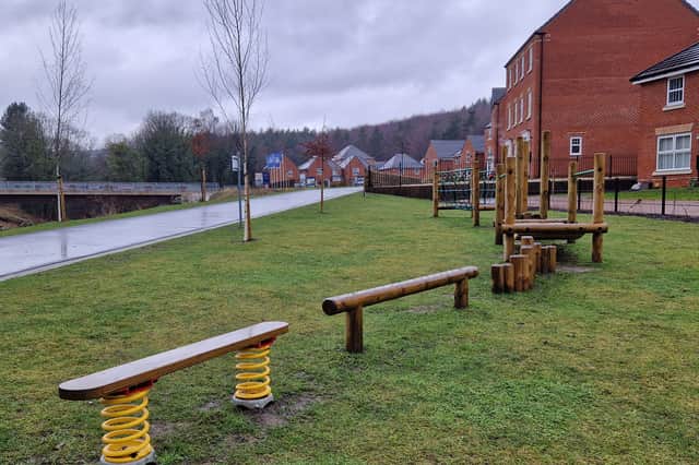 Children's play equipment at the new Oughtibridge Valley housing estate in Sheffield