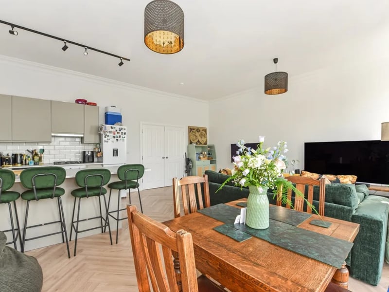 The listing says: "This impressive and fully refurbished building boasts a total area of 5,220.50 sq. Ft. And comprises four spacious three-bedroom apartments and one spacious two-bedroom apartment."