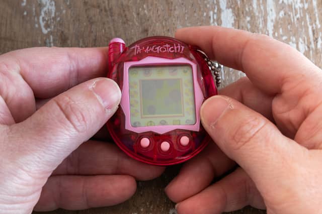 Tamagotchi are tiny virtual pets in a distinctively egg-shaped case, which allows you to carry them around with you. You would raise your pet from egg to adult, taking care of their needs to keep them happy and healthy.
Originally from Japan, Tamagotchi became a sensation across the world in the late 90s and early 2000s. However, they ended up being banned in quite a number of schools. This was in large part because of how distracting they were, with pets frequently becoming hungry, unhappy, or even sick if you didn’t clean up their droppings. No kid wanted their Tamagotchi to die, and that - combined with their constant beeps when they needed attention - didn’t exactly make them a good fit for the classroom.