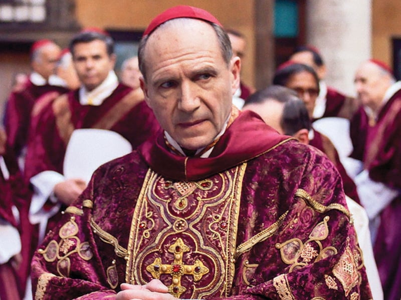 'Conclave', Edward Berger's adaptation of the Robert Harris book about the selection of a new Pope, stars Ralph Fiennes and Stanley Tucci. It's coming back to many cinemas in February, and is also available to rent or buy on Apple TV+.