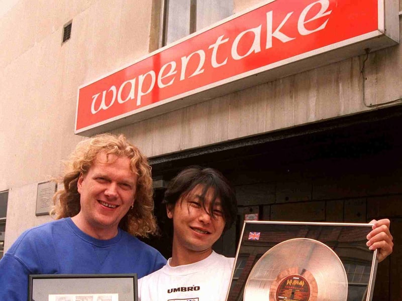 Pictured outside the Wapentake bar, on Wellington Street, Sheffield, in 1998 are Def Leppard fan Tadashi Onuma, from Tokyo, Japan, holding Def Leppard memorabilia from the bar, and the Wapentake's owner Bob Murvin