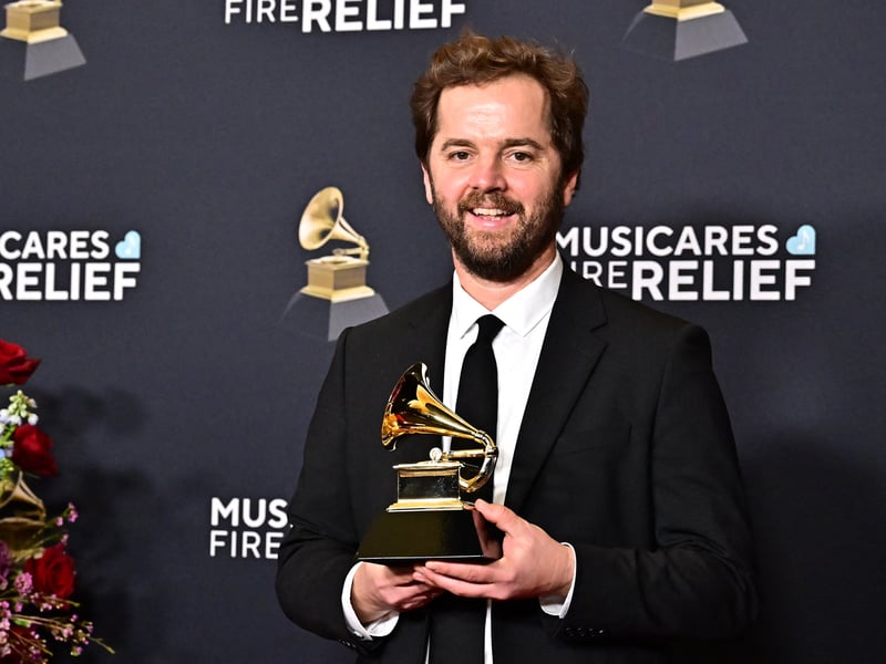 US executive producer Joedan Okun poses in the press room with the Grammy for Best Music Film for "American Symphony Jon Batiste" during the 67th Annual Grammy Awards. 