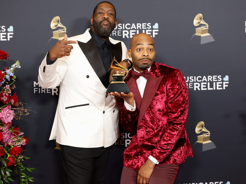 Adam Blackstone and Brandon Victor Dixon, winners of Best Musical Theatre Album for Hell’s Kitchen pose in the press room during the 67th GRAMMY Awards.