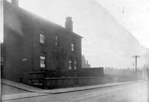 Armley Road at the junction with Tennant Street looking towards Low Moor Side in April 1929. The house is number 149 owned by Arthur John Pollard, Physician and surgeon. He also owned number 135 Armley Road which was his surgery.