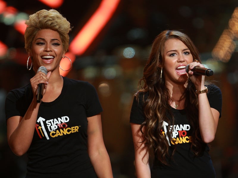 Beyonce and Miley Cyrus performing together in 2008.