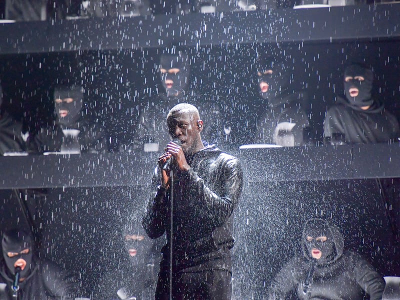 In a powerful moment, Stormzy used his Best British Male and Album of the Year wins to criticize then-Prime Minister Theresa May's response to the Grenfell Tower fire. His freestyle called out the government's inaction and struck a chord with viewers, blending music with political activism.