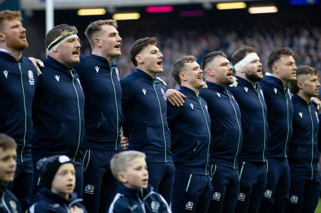 The Scotland squad during the national anthem ahead of the Six Nations opener against Italy at Scottish Gas Murrayfield. (Photo by Craig Williamson / SNS Group)