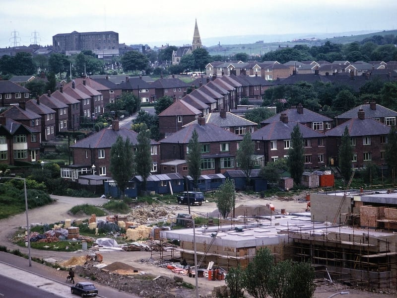 A telephoto view from the tower of Morley Town Hall looking towards Bruntcliffe. On the horizon are Bruntcliffe Mills and Morley Cemetery Church spire. Both have now disappeared; the mill as a result of a serious fire and the church had to be demolished as it was found to be structurally unsafe.