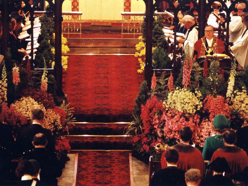 Inside the Parish Church of St. Peter on Rooms Lane, during the last Mayor's Sunday for Morley Corporation in May 1973. The Mayor of Morley, Alderman J. S. Binks, is seen reading the lesson and the Vicar of Morley, Canon A. Gwynne John, is with the choir members over the left shoulder of the Mayor.