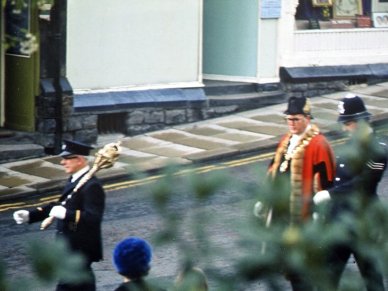 Jack Leach, the mace bearer, preceding the Mayor of Morley and his protective police sergeant on their way down Scatcherd Hill in marching from the Town Hall to the Parish Church. This was in May 1973 for the last of the Mayor's Sundays. The Mayor is Alderman John Samuel Binks, Morley's last, whose term of office was April 17, 1973 to March 31, 1974.