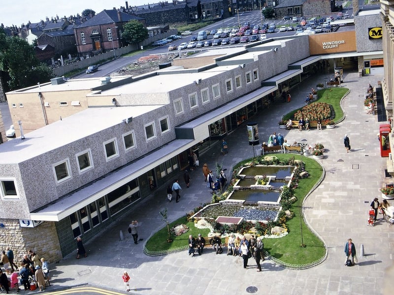 Windsor Court shopping precinct in August 1973 showing the layout and the flower beds. The new precinct was completed in October 1972 so that there would be at least 10 weeks' shopping time to Christmas; Morrison's was opened at the same time.