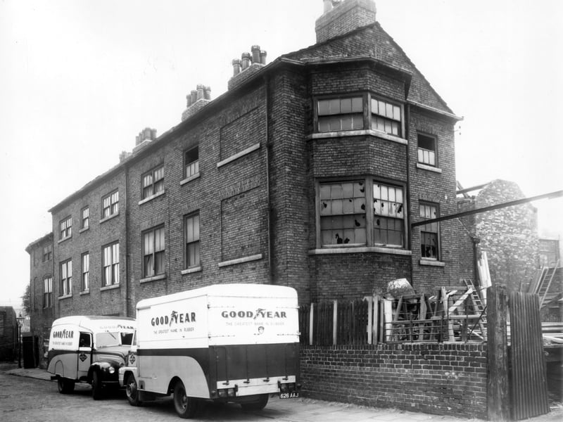 Two delivery vehicles for the Goodyear Tyre and Rubber company are outside number 10 Sheepscar Grove. Pictured in October 1962.