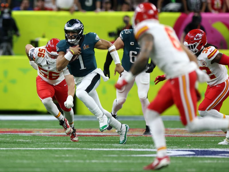 Philadelphia Eagles' Jalen Hurts rushed for 72 yards, setting a new Super Bowl record for a quarterback, surpassing his own previous record of 70 yards from Super Bowl LVII.