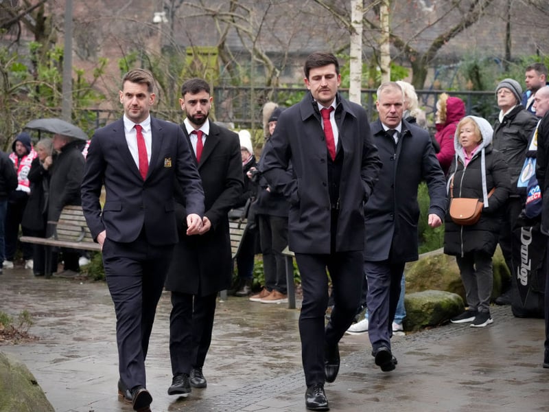 Current players Tom Heaton, Bruno Fernandes and Harry Maguire arrive to attend the funeral.