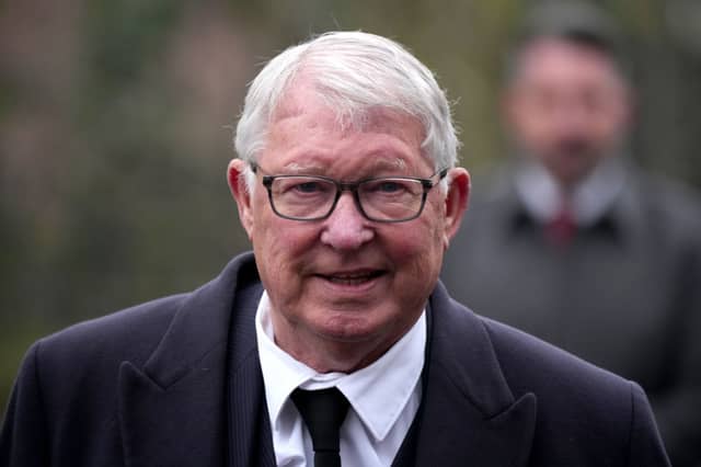 Sir Alex Ferguson arrives to attend the funeral of Denis Law.