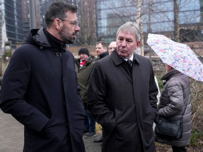 Ruud van Nistelrooy and Bryan Robson share a few words outside the cathedral.