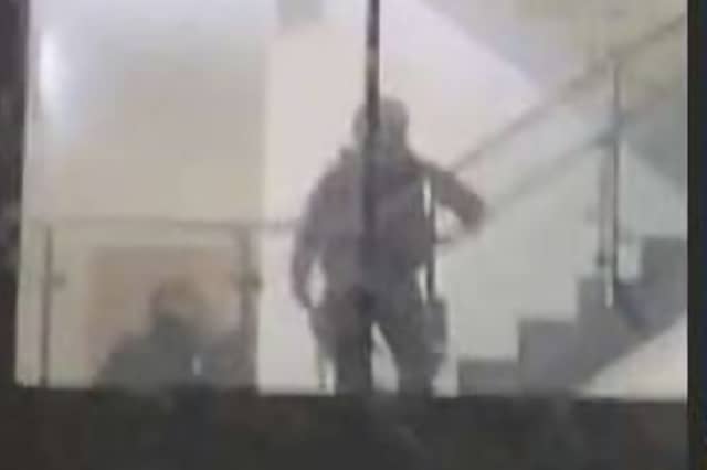 Police pictured inside the building. Photo: Submitted