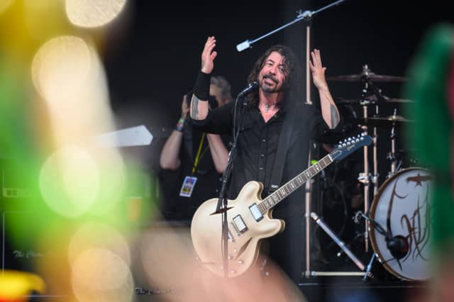 Foo Fighters, having had to cancel their headline set due to Dave Grohl’s leg injury earlier that year, made an unexpected return to the stage under the alias "The Churn Ups." This secret performance at Glastonbury became one of the festival's most iconic moments.