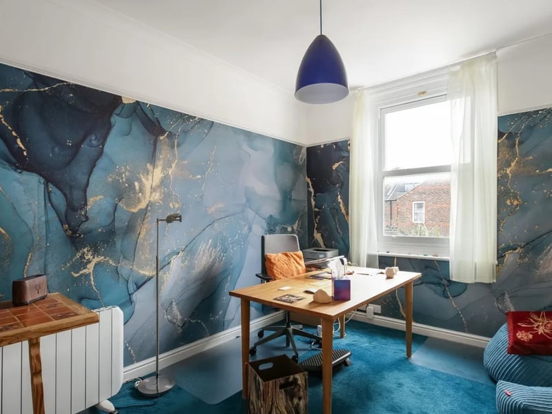 This home comes with four brilliantly sized bedrooms, two bathrooms and three reception rooms. 
