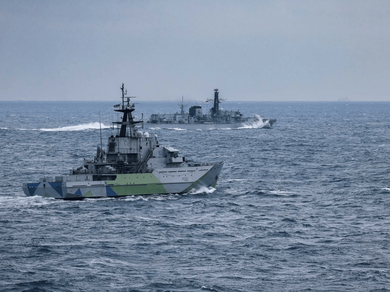 HMS Iron Duke and HMS Tyne making their approach on a Russian warship.