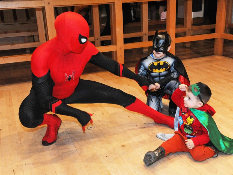 Spiderman meets five-year-old Christopher Plasek, and his two-year-old brother Alexander, of Halton.
