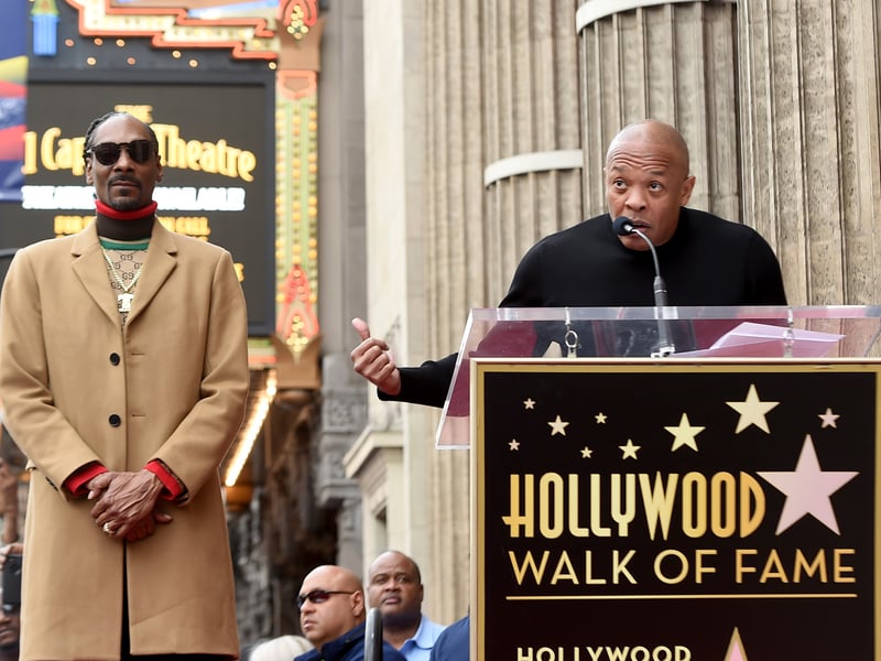 Snoop Dogg, with Dr. Dre (R) is honored with a star on The Hollywood Walk Of Fame on Hollywood Boulevard on November 19, 2018 in Los Angeles, California.