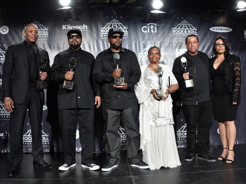 Dr. Dre, Ice Cube, MC Ren and DJ Yella of N.W.A. pose with Eazy-E's mother, Katie Wright and Tomica Woods-Wright , at the 31st Annual Rock And Roll Hall Of Fame Induction Ceremony at Barclays Center on April 8, 2016 in New York City.