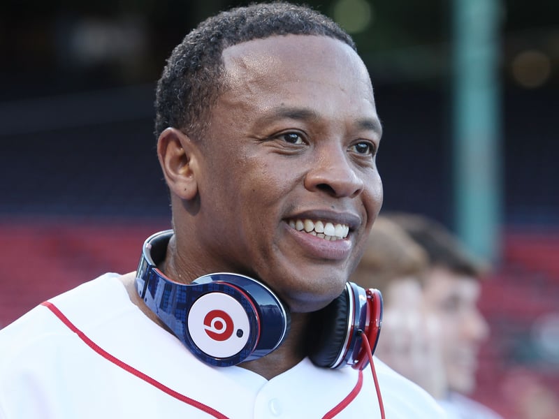 Producer and musician Dr. Dre is on the field before the Boston Red Sox take on the the New York Yankees on April 4, 2010 during Opening Night at Fenway Park in Boston, Massachusetts.