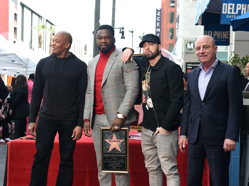 (L-R) Dr. Dre, 50 Cent, Eminem, and Legendary Global Managing Director Chris Albrecht pose during the 50 Cent Walk Of Fame Ceremony on January 30, 2020 in Hollywood, California.