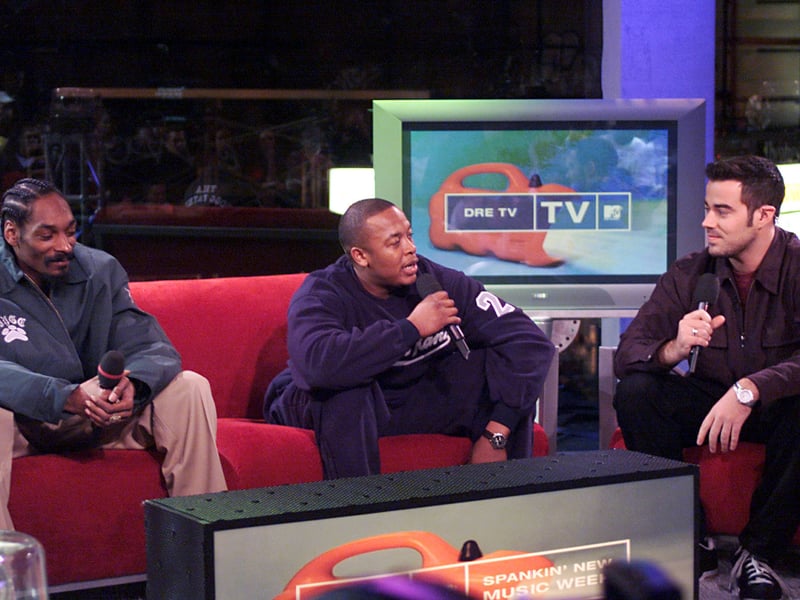 MTV on air host Carson Daly with Snoop Dogg (left), and Dr. Dre during 'MTV Spankin New Music Week', in the MTV Times Square studio in New York City.