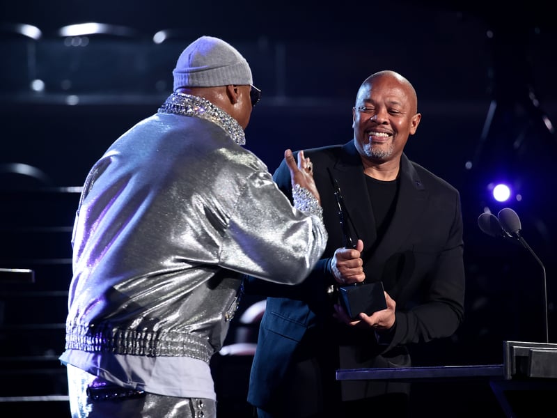 : Dr. Dre inducts LL Cool J onstage during the 36th Annual Rock & Roll Hall Of Fame Induction Ceremony at Rocket Mortgage Fieldhouse on October 30, 2021 in Cleveland, Ohio.